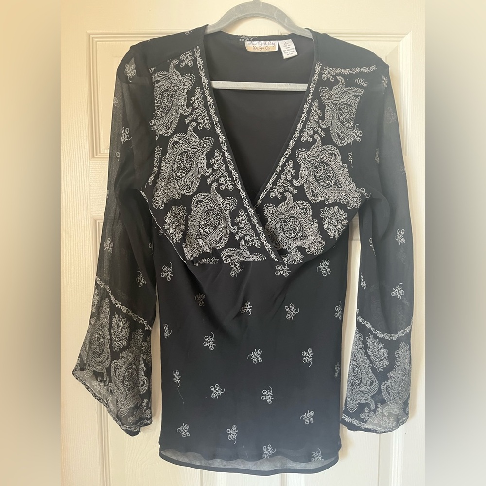 Black patterned top.  Size Large.